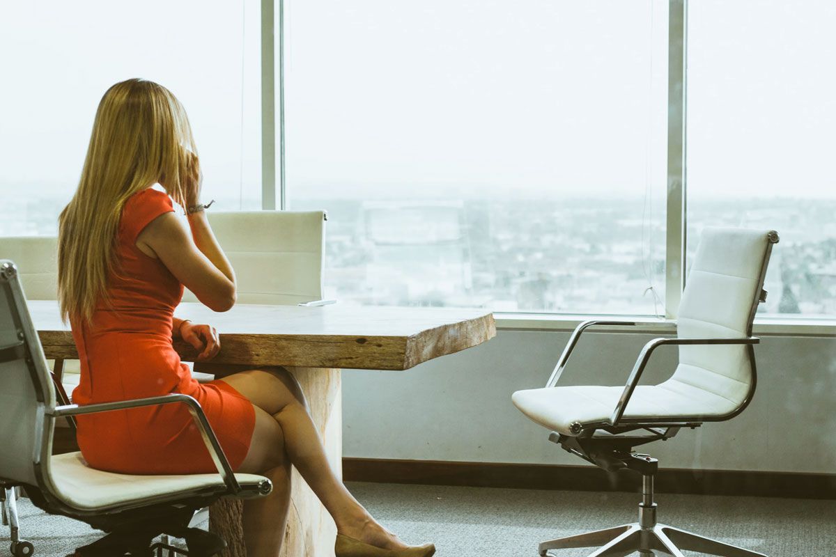 Woman At A Desk